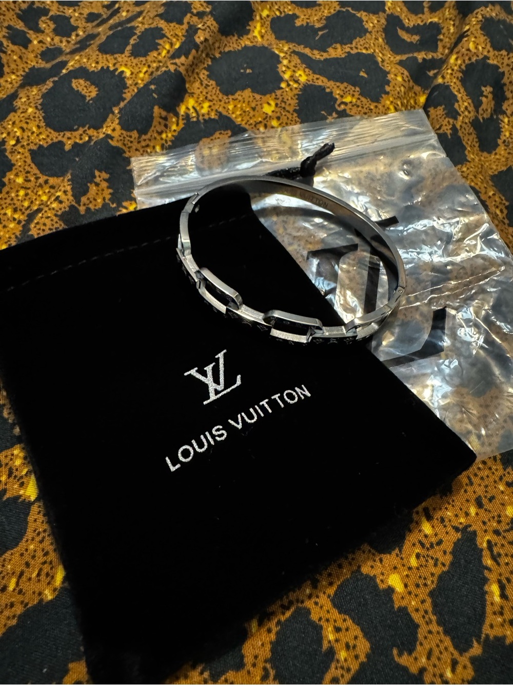 Louis Vuitton Silver Logo Cuff Bracelet - Picture 8 of 8